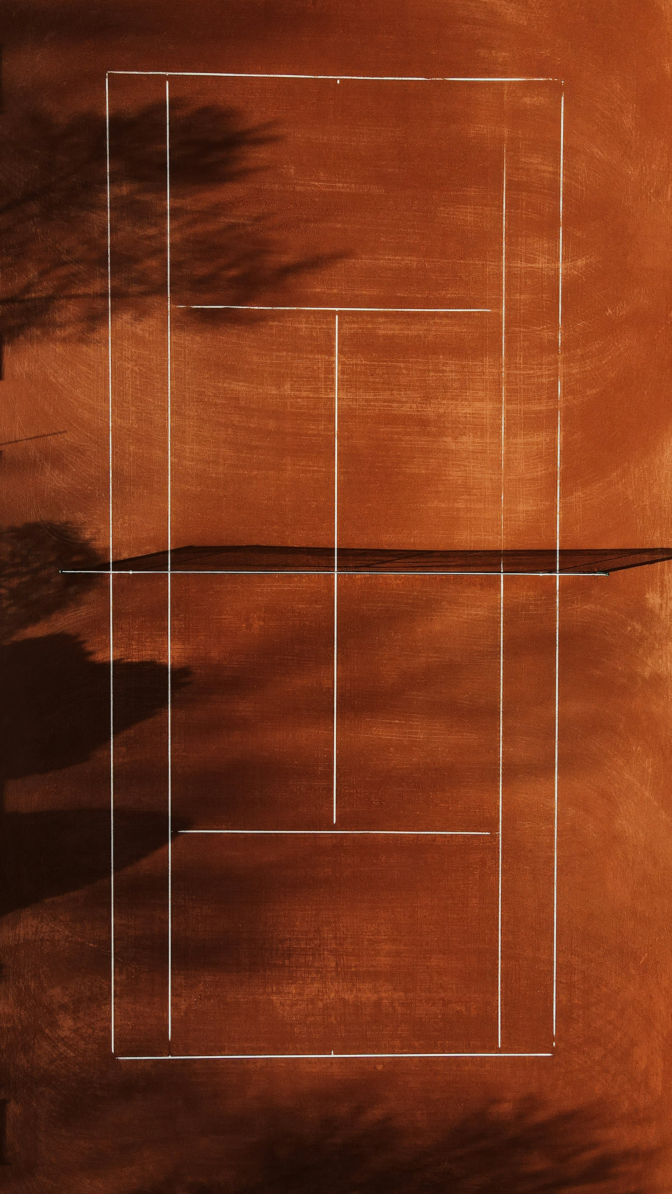 Overhead view of a clay tennis court